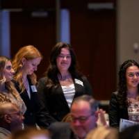 People standing at the 2023 Economic Forecast Event